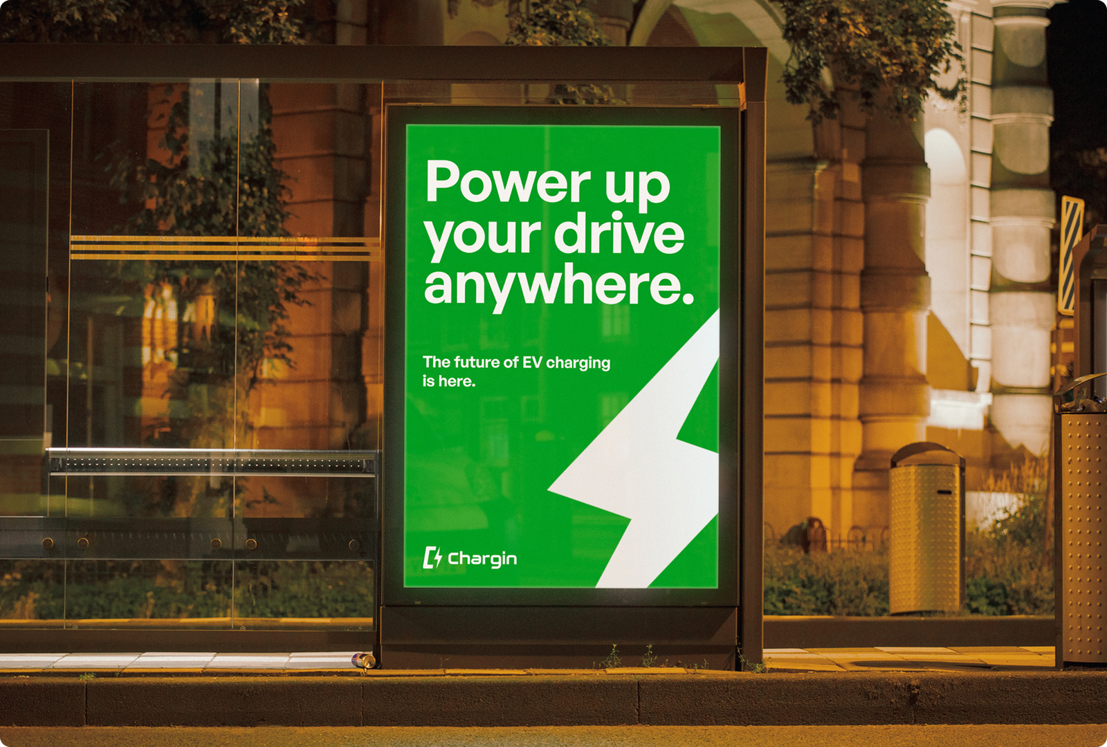 Chargin bus-shelter advertisement, Power up your drive, anywhere
